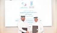 UDST President Dr. Salem Al Naemi (right) and QSE Acting CEO Abdulaziz Nasser Al Emadi during the MoU signing.