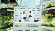 Amro Al Hamad, CEO Lusail International Circuit and Executive Director Qatar Motor and Motorcycle Federation (left) and Thabet Musleh, SVP Qatar Duty Free at the agreement signing.