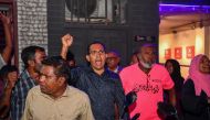 Supporters of People's National Congress (PNC) party and pro-China frontrunner Mohamed Muizzu shout slogans along a street in Male on September 30, 2023, to demand the release of arrested Maldives' former president Abdulla Yameen. (Photo by Mohamed Afrah / AFP)
