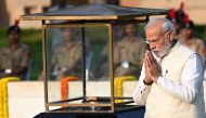 India's Prime Minister Narendra Modi pays respect on the occasion of Mahatma Gandhi's birth anniversary at his memorial in Rajghat, in New Delhi on October 2, 2023. (Photo by Sajjad Hussain / AFP)