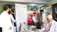 People receive healthcare under a QRCS-KRCS project in Afghanistan.