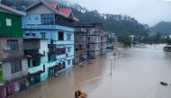 This handout photograph released by the Indian Army and taken on October 4, 2023, shows a flooded street in Lachen Valley, in India's Sikkim state following a flash flood caused by intense rainfall. (Photo by Indian Army / AFP) 