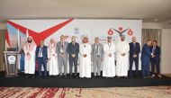 Officials pose for a group photo during the ‘Fourth Arab Arbitration Conference.’