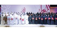 Prime Minister and Minister of Foreign Affairs H E Sheikh Mohammed bin Abdulrahman bin Jassim Al Thani and Minister of Education and Higher Education H E Buthaina bint Ali Al Jabr Al Nuaimi with top-performing and long-serving teachers on the occasion of World Teachers' Day yesterday. 