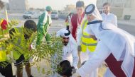 Members of the youth body at Al Rayyan Club planting trees. 