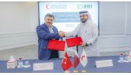 Acting Secretary-General of QRCS Faisal Mohamed Al Emadi and Secretary-General of IHH Durmuş Aydın at the signing ceremony.
