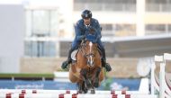 Qatari rider Ghanim Nasser Al Qadi astride Quick Step during an earlier edition of the Longines Hathab Qatar Equestrian Tour, in this file photo.