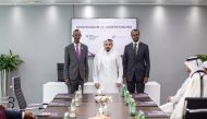QFC CEO, Yousuf Mohamed Al Jaida (centre) and Rwanda Finance Limited, CEO Nick Barigye during the MoU signing.