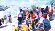Beneficiaries receiving water provided under QRCS’s Drinking Water Trucking project in Somalia.