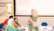 Indonesian Minister of Manpower, H E Ida Fawziya, addressing a gathering of Indonesian expats in Al Khor recently.