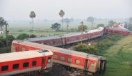 A general view shows damaged carriages near Raghunathpur railway station some 44 Km from Buxar on October 12, 2023, after an express train derailed late on October 11 in India's Bihar state. Photo by Sachin KUMAR / AFP