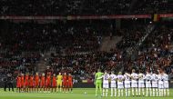 Belgium team (L) and Swedish team listen to the national anthems prior to the Euro 2024 qualifying football match between Belgium and Sweden at the King Baudouin Stadium in Brussels on October 16, 2023. (Photo by JOHN THYS / AFP)
