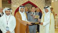 QREC Chairman Issa bin Mohammed Al Mohannadi presents the memento to H R H Prince Moulay Rachid in presence of Ambassador of Qatar to Morocco H E Sheikh Abdullah bin Thamer Al Thani.  