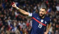 France's Karim Benzema (L) with teammate Kylian Mbappe (R) on the substitute bench. Reuters file photo.