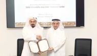 QU President Dr. Omar Al Ansari and Chief Executive Officer of QFC Yousuf Mohamed Al Jaida (left) during the MoU signing.