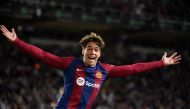 Barcelona's Spanish forward #38 Marc Guiu celebrates after scoring his team's first goal during the Spanish league football match between FC Barcelona and Athletic Club Bilbao at the Estadi Olimpic Lluis Companys in Barcelona on October 22, 2023. (Photo by Josep Lago / AFP)
 