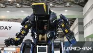 Japanese robotics startup Tsubame Industries exhibit the ARCHAX robot, weighing 3.5 tonnes and measuring 4.5 meters in height, during the press day of the Japan Mobility Show in Tokyo on October 25, 2023. (Photos by Kazuhiro NOGI / AFP)
