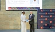 Aamal Company CEO Rashid bin Ali Al Mansouri with the Dean of CMU-Q Dr. Michael Trick during Lecture Series.