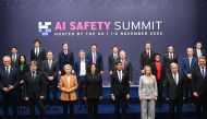 (Front row L-R) France's Minister for Economy, Finance, Industry and Digital Security Bruno Le Maire, German Economy and Climate Minister Robert Habeck, European Commission President Ursula von der Leyen, US Vice President Kamala Harris, Britain's Prime Minister Rishi Sunak, Italy's Prime Minister Giorgia Meloni, UN Secretary General Antonio Guterres and Australia's Deputy Prime Minister and Minister of Defence Richard Marles pose together for the family photo at the UK Artificial Intelligence (AI) Safety Summit at Bletchley Park, in central England, on November 2, 2023. (Photo by Leon Neal / POOL / AFP)