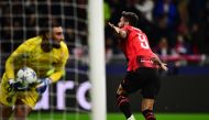AC Milan's French forward #09 Olivier Giroud celebrates after scoring the team's second goal during the UEFA Champions League 1st round group F football match between AC Milan and Paris Saint-Germain at the San Siro stadium in Milan on November 7, 2023. (Photo by Marco BERTORELLO / AFP)
