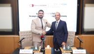 QNCC GM Robert Tripoli (right) with CEO of Mangusteen Malik Shishtawi during the agreement signing ceremony.