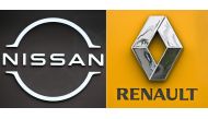 This combination of pictures made on January 17, 2023 shows the logos of French automaker Renault and its Japanese partner Nissan displayed in a showroom in Tokyo. Photo by Kazuhiro NOGI / AFP