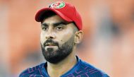 Afghanistan’s captain Hashmatullah Shahidi warms up during a practice session on the eve of their match against South Africa. AFP