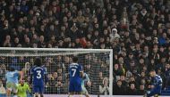 Manchester City's English midfielder #80 Cole Palmer (R) scores their fourth goal from the penalty spot during the English Premier League football match between Chelsea and Manchester City at Stamford Bridge in London on November 12, 2023. (Photo by Glyn KIRK / IKIMAGES / AFP) 
