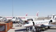 Qatar Airways aircraft are pictured on the tarmac during the 2023 Dubai Airshow at Dubai World Central - Al-Maktoum International Airport in Dubai yesterday.