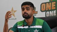 Pakistan's cricket team captain Babar Azam speaks during a press conference at the Gaddafi Stadium in Lahore on September 26, 2023. (Photo by Arif Ali / AFP)

