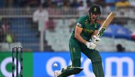 South Africa's David Miller plays a shot during the 2023 ICC Men's Cricket World Cup one-day international (ODI) second semi-final match between Australia and South Africa at the Eden Gardens in Kolkata on November 16, 2023. (Photo by Arun SANKAR / AFP) /