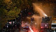 Police uses a water cannon towards protesters outside the Vassil Levski Stadium ahead of the UEFA Euro 2024 Group G qualification football match between Bulgaria and Hungary, at the Vassil Levski Stadium in Sofia, on November 16, 2023. Photo by Nikolay DOYCHINOV / AFP