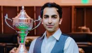 India’s Pankaj Advani poses with his trophy. 
