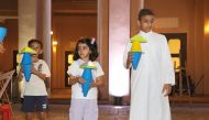 Children making a presentation at the event.