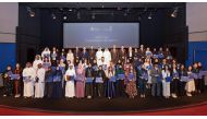 UDST President Dr. Salem Al Naemi and other officials with high-achieving students at the awards.