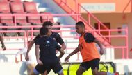 Al Shamal players in action during a training session yesterday.