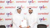CEO of Ooredoo Qatar H E Sheikh Ali bin Jabor Al Thani (left) and CEO of QNBN Eng. Ahmed Mohamed Al Kuwari at the agreement signing ceremony. 