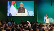 India Prime Minister Narendra Modi speaks at the High-Level Segment for Heads of State and Government session during the United Nations climate summit in Dubai on December 1, 2023. (Photo by Giuseppe Cacace / AFP)