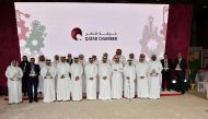 Qatar Chamber officials with sponsors during the honouring ceremony.