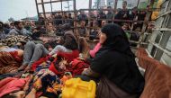 Palestinians wounded during Israeli bombardment are transported to Nasser hospital in Khan Yunis in the southern Gaza Strip on December 5, 2023. Photo by Mahmud HAMS / AFP