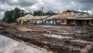 Streets are seen covered on mud following landslides and flooding triggered by heavy rainfall in Katesh, Tanzania on December 5, 2023. (Photo by Ebby SHABAN / AFP)
