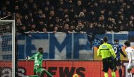Atalanta's Colombian forward #09 Luis Muriel (2R) kicks the ball and scores his team's third goal during the Italian Serie A football match between Atalanta BC and AC Milan at the Gewiss Stadium in Bergamo, on December 9, 2023. (Photo by Isabella BONOTTO / AFP)
