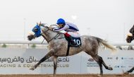 Carlos Henrique guides Alouqa during the feature for Ras Mlaiji Cup yesterday. PIC: Juhaim/QREC 