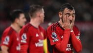 Manchester United's Portuguese midfielder #08 Bruno Fernandes (R) reacts during the English Premier League football match between Manchester United and Bournemouth at Old Trafford in Manchester, north west England, on December 9, 2023. (Photo by Oli SCARFF / AFP)