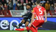 Manchester City's English midfielder Micah Hamilton (left) scores his team's first goal during the UEFA Champions League Group G day 6 group stage football match between Crvena Zvezda (Red Star Belgrade) and Manchester City at the Red Star stadium in Belgrade, on December 13, 2023. (Photo by PEDJA MILOSAVLJEVIC / AFP)