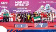 The podium winners celebrate with their trophies at the closing ceremony of the MENA Karting Championship Nations Cup at the Lusail International Circuit’s (LIC) karting track yesterday.