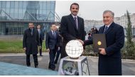 Amir H H Sheikh Tamim bin Hamad Al Thani with President of the Republic of Uzbekistan H E Shavkat Mirziyoyev in Tashkent yesterday.
