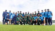 Bangladesh pose for a team photo after their match win during the 3rd ODI cricket match between New Zealand and Bangladesh in Napier on December 23, 2023. (Photo by Marty Melville / AFP)