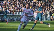 Juventus' Serbian forward #09 Dusan Vlahovic (C) after scoring a goal during the Italian Serie A football match between Frosinone and Juventus at the Benito Stirpe stadium in Frosinone on December 23, 2023. (Photo by Andreas SOLARO / AFP)
