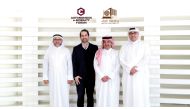 Dean of QU College of Engineering Dr. Khalid Kamal Naji (second right) with other officials. 